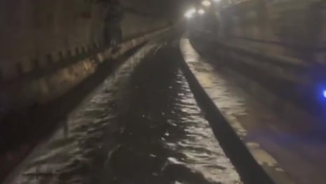 Extreme flooding in tunnel used by Eurostar halts trains – video