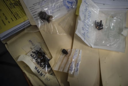Bullets and bullet fragments recovered from the bodies of patients attached to their medical records.