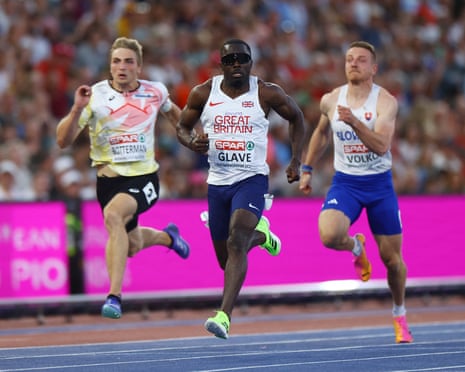 Great Britain's Romell Glave crosses the line to win his men's 100m semi-final.
