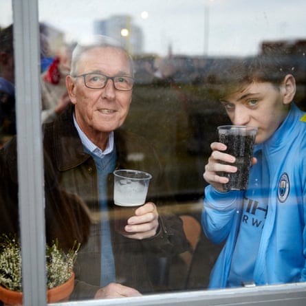 City fans Kevin Halpin and grandson Jackson Halpin in Hit the Bar which opened early to serve drinks and breakfast before the early kick-off.
