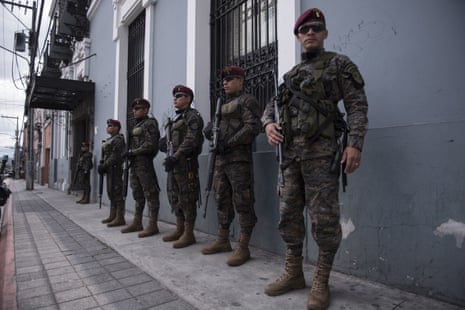 Soldiers stand guard near Guatemala’s congress building.