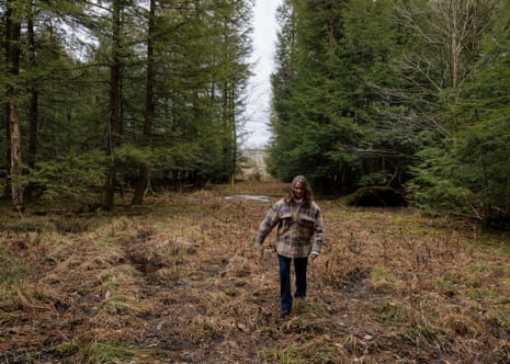 Beth Shoff walks through a wetland near her home.