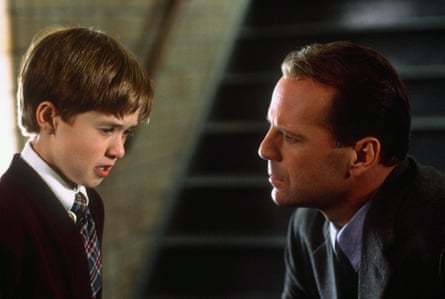 Osment, aged 10, with Bruce Willis in The Sixth Sense.