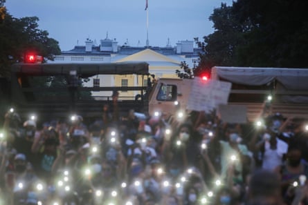 Protest against the death in Minneapolis police custody of George Floyd, in WashingtonDemonstrators use the light of their cellphones as they gather during a protest against the death in Minneapolis police custody of George Floyd, near the White House in Washington, U.S., June 3, 2020.