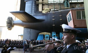 A military orchestra plays during a ceremony to launch a multipurpose nuclear submarine at the Sevmash shipyard in Russia in June 2010.