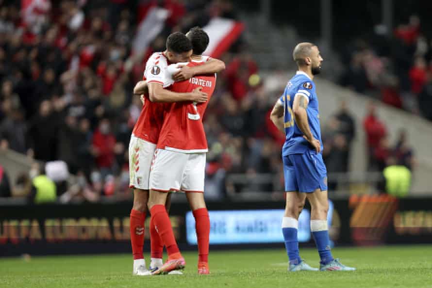 Braga players celebrate at the final whistle.