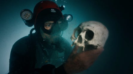 Alas, poor cave-dweller … a diver uncovers fossil traces of Mayan ancestors in the film.