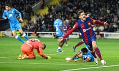 Sergi Roberto celebrates after earning Barcelona a late victory over Almería.