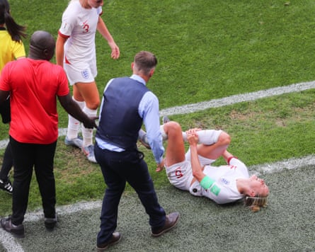 Steph Houghton lies injured against Cameroon.