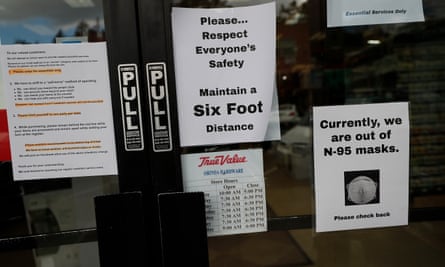 Signs remind customers of coronavirus orders at a harware store in Orinda, California.