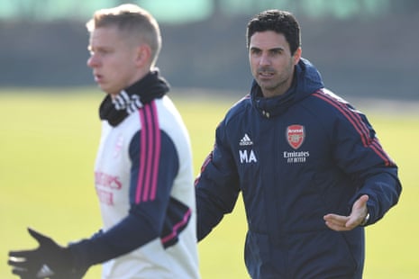 Mikel Arteta (right) on the training ground earlier this week