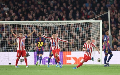 Julian Alvarez (second right) celebrates scoring his team's first goal.