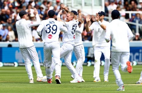 Ben Stokes of England celebrates taking the wicket of Devon Conway.