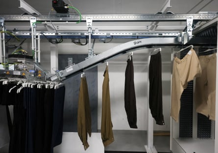 A machine sorts clothes on the opening day of Lefties' first store in Britain