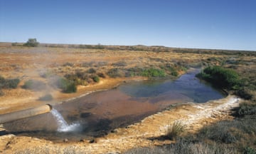 Artesian Well on Birdsville Track in Australia<br>Hot water pours from an artesian bore along Birdsville Track on the Great Artesian Basin in Southern Australia.