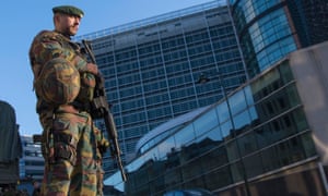 A Belgian soldier patrols outside the European commission headquarters