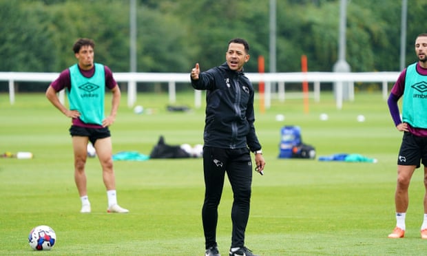 Liam Rosenior leads his Derby players through a training session.