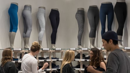 Mannequins display leggings inside a Lululemon store in London