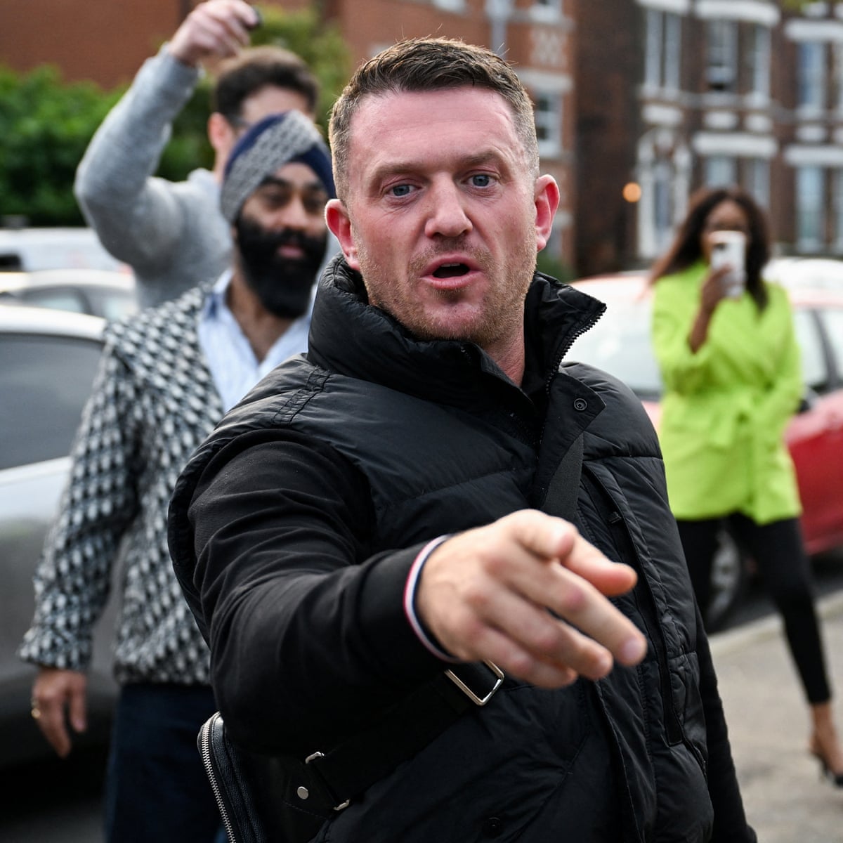 Tommy Robinson charged with phone offence under Terrorism Act – as it happened | UK news | The Guardian