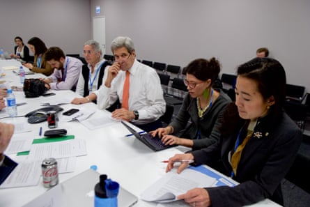 Secretary Kerry and a team of advisers discuss the final draft language of the agreement.