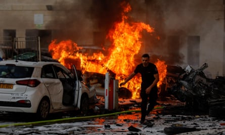 A fire burns in Ashkelon, Israel after rockets were launched from the Gaza Strip.