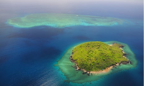 Uninhabited island with coral reef, near Grande Terre island, Mayotte.