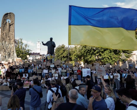 Ukrainian people attend a protest against the restriction of the autonomy of Ukrainian anti-corruption authorities in Lviv, western Ukraine,