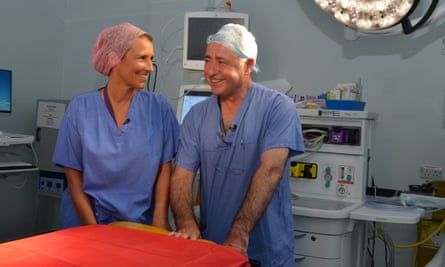 Isabel Quigora and Richard Smith pose for a picture in the operating theatre