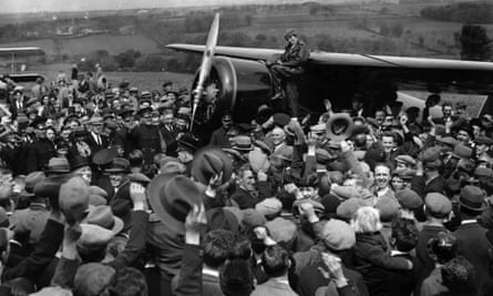 EARHARTFILE--A crowd cheers for Amelia Earhart, the first woman to fly across the Atlantic alone, as she boards her single-engine Lockheed Vega airplane in Londonderry, Northern Ireland, for the trip to London May 22, 1932. Earhart vanished mysteriously over the Pacific during her attempted round-the-world flight in 1937. (AP Photo/File)