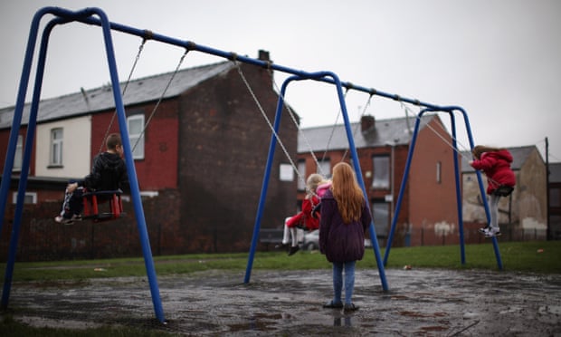 Children play in a park in Gorton near Manchester