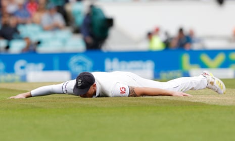 Ben Stokes of England shows a look of dejection after Travis Head of Australia hits a boundary.