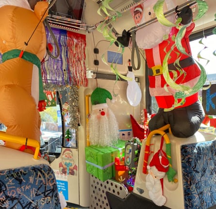 Is that Santa’s workshop? Streamers and stockings greet commuters on this Christmas bus.