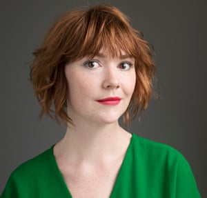 Elf Lyons wearing a green dress