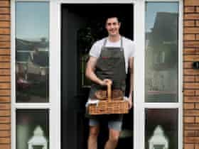 Karl Simmonds with a basket of baked goods.