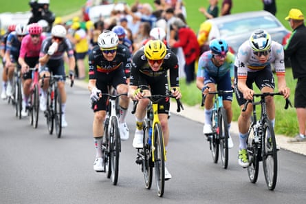 Tim Wellens, Matteo Jorgenson and Ivan Romeo, left to right, compete in the breakaway during the 20th stage of the Tour de France.