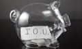 A piggy bank with IOU note.