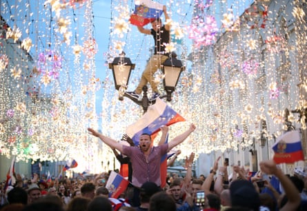 Fans in in Nikolskaya Street celebrate Russia’s victory over Spain.