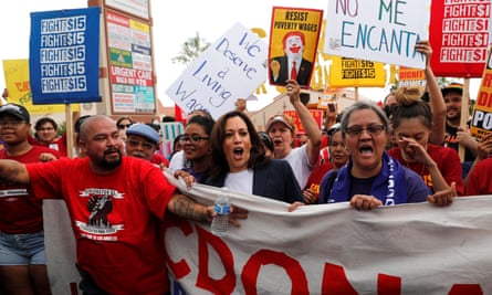 US senator Kamala Harris, center, joins striking McDonalds workers in Las Vegas demanding an increase in the minimum wage.