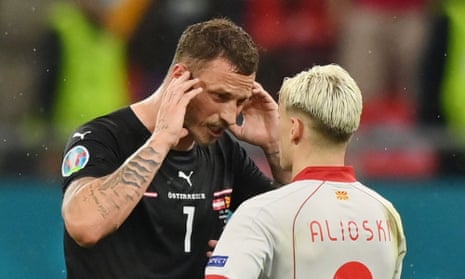 Austria’s Marko Arnautovic and North Macedonia’s Ezgjan Alioski after Monday’s Euro 2020 match
