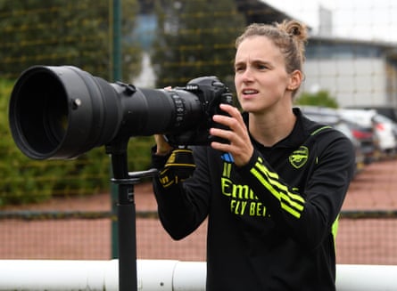 Vivianne Miedema takes some pictures during Arsenal training.