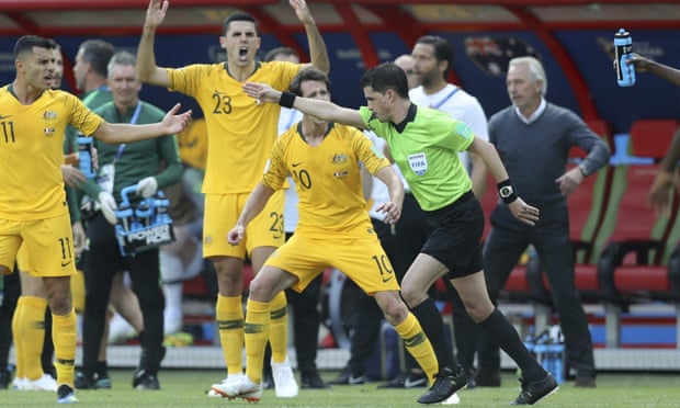 Australian players react angrily as the Uruguayan referee Andrés Cunha awards France a penalty after consulting the VAR during the sides’ Group C match.