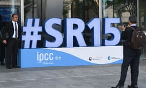 Attendees take a photo before the opening of the 48th session of the IPCC in Incheon