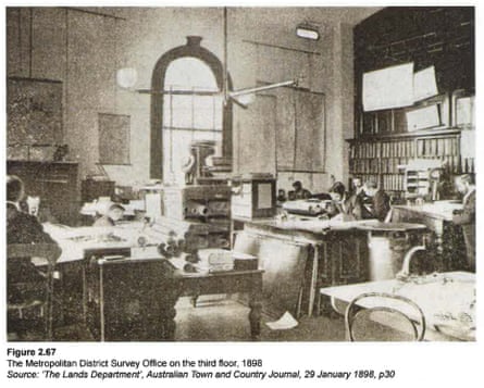 A clipping of a black and white image of an office interior with text below