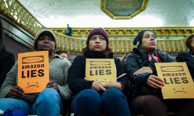 Anti-Amazon protesters at New York city hall. Photograph: Drew Angerer/Getty Images