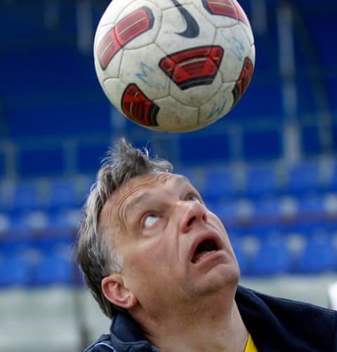 File photo of Hungarian Prime Minister Viktor Orban heading a football