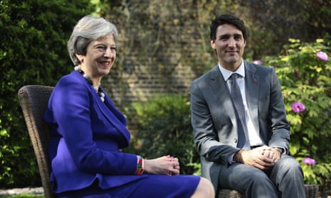 Theresa May posing for a photo with Canada’s Prime Minister Justin Trudeau during bilateral talks at Downing Street today.