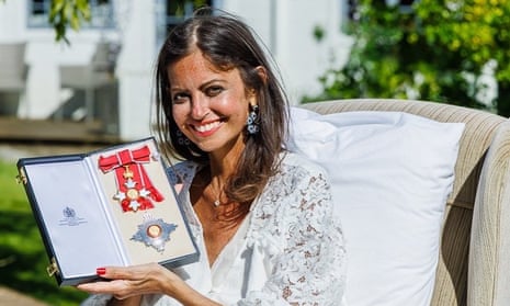 Deborah James with her damehood, which was personally delivered by Prince William.
