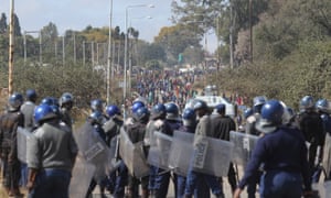Armed police in Harare.