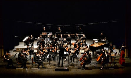 An orchestra performing on stage