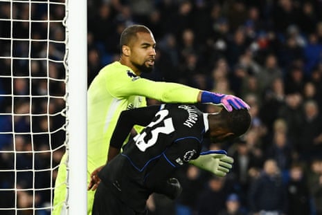 Chelsea's Trevoh Chalobah is congratulated by his goalkeeper Robert Sanchez after clearing a shot off the line.